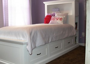 Custom Maple twin bed with built in book shelfving and drawers